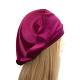 Purple headscarf on a mannequin head against a white background ireland