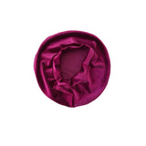 Purple satin headscarf on a white background