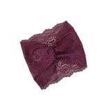 Purple lace bow on a white background