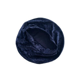 Navy blue velvet beret on a white background