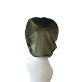 Dark green hood on a mannequin head against a white background