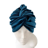 Blue headscarf on a mannequin head against a white background ireland