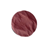 Round brown rug on a white background