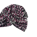 Leopard print headscarf with a knot on a white background