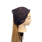 Navy lace headband on a mannequin head with blonde hair against a white background