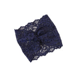 Navy blue lace fabric on a white background