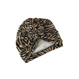 Zebra print turban on a white background