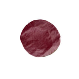 Round maroon stone on a white background