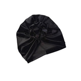 Black turban on a white background