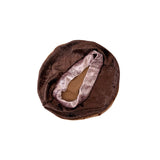 Brown fuzzy headband with a velvety strap on a white background