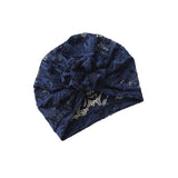 Navy blue lace headscarf on a white background