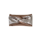 Bandeau top with ribbed brown trim and satin finish on a white background