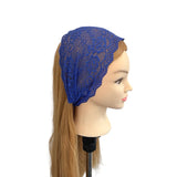 Mannequin head with blue lace headband on a white background