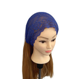 Blue lace headband on a mannequin head with brown hair against a white background