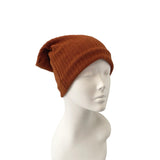 Brown knit beanie on a mannequin head against a white background