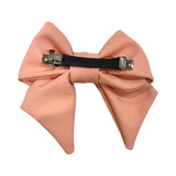 Oversized salmon pink fabric hair bow barrette clip 