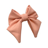 Oversized salmon pink fabric hair bow barrette clip 
