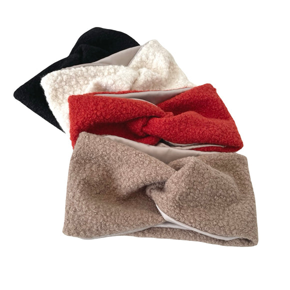 Four headbands in black, white, red, and beige on a white background