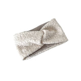 white patterned headband on a white background