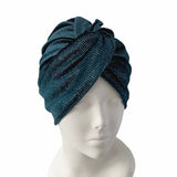 Blue textured turban on a mannequin head against a white background ireland