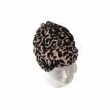 Leopard print headscarf on a white background