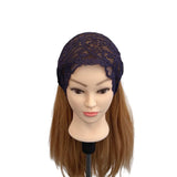Mannequin head with brown hair wearing a black lace headband on a white background