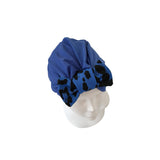 Blue headscarf with black patterns on a mannequin head against a white background