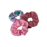 Three scrunchies with different patterns on a white background