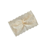 Lace headband with a bow on a white background
