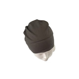 Dark gray beanie on a mannequin head against a white background