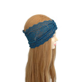 Blue lace headband on a mannequin head with long blonde hair against a white background