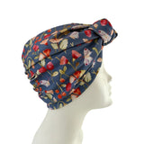 Floral headscarf on a mannequin head against a white background
