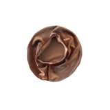 Brown velvet beret on a white background