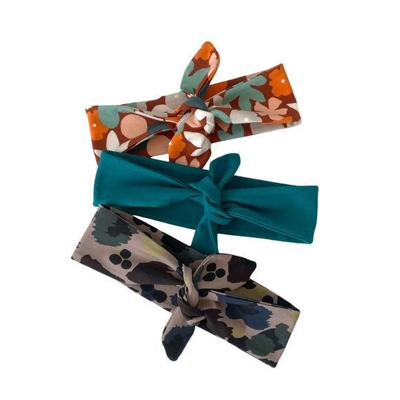 Three patterned hairbands on a white background
