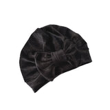 Black velvet turban on a white background