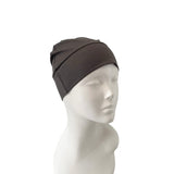 Dark gray head wrap on a mannequin head against a white background