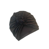 Black turban on a white background