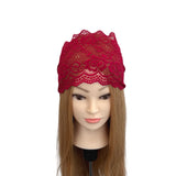 Red lace headband on a mannequin head with long hair against a white background