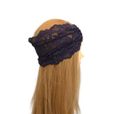 Navy lace headband on a mannequin head with blonde hair against a white background