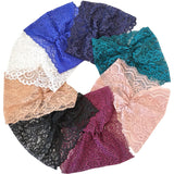 Collection of lace fabric samples in various colors arranged in a circular pattern.