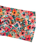 Floral patterned fabric with colorful flowers on a white background