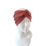 Turban on a mannequin head against a white background
