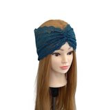 Blue lace headband on a mannequin head with long brown hair against a white background